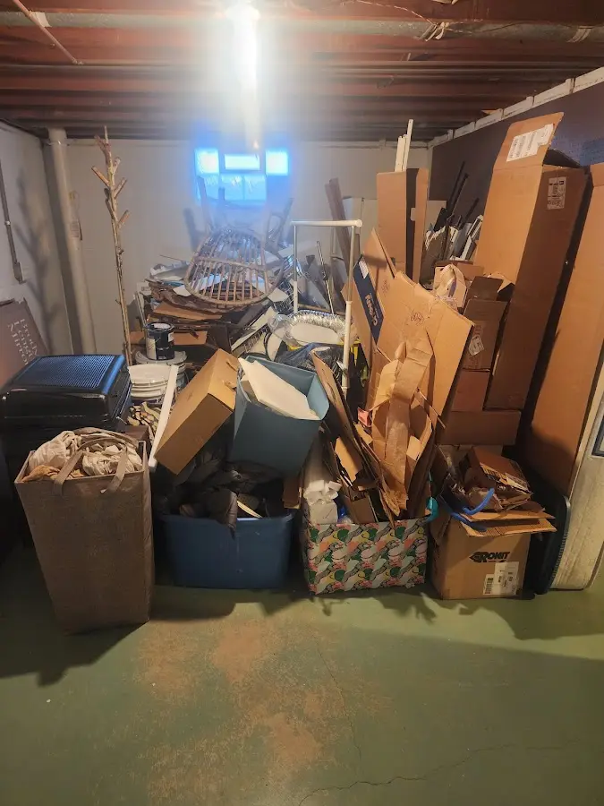 Roll-off dumpster container at job site for 4 Yard Dumpster Rental in Indianola